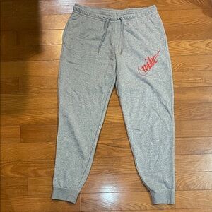 Nike women’s Gray joggers with Red Logo
